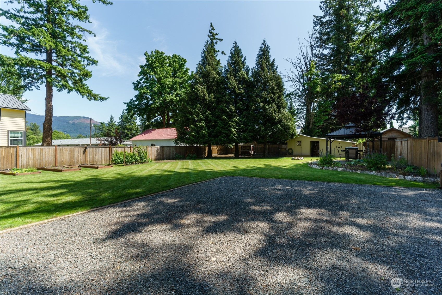 402 West 3rd Street Nooksack, WA 98276 - Photo 3 of 36 a view of a house with a yard