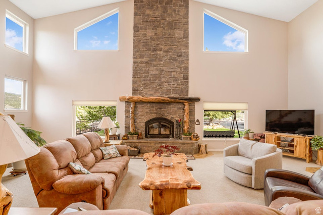 48 South Sage Road Pine Valley, UT 84781 - Photo 16 of 61 Vaulted ceilings with high-set trapezoidal windows characterize this living area