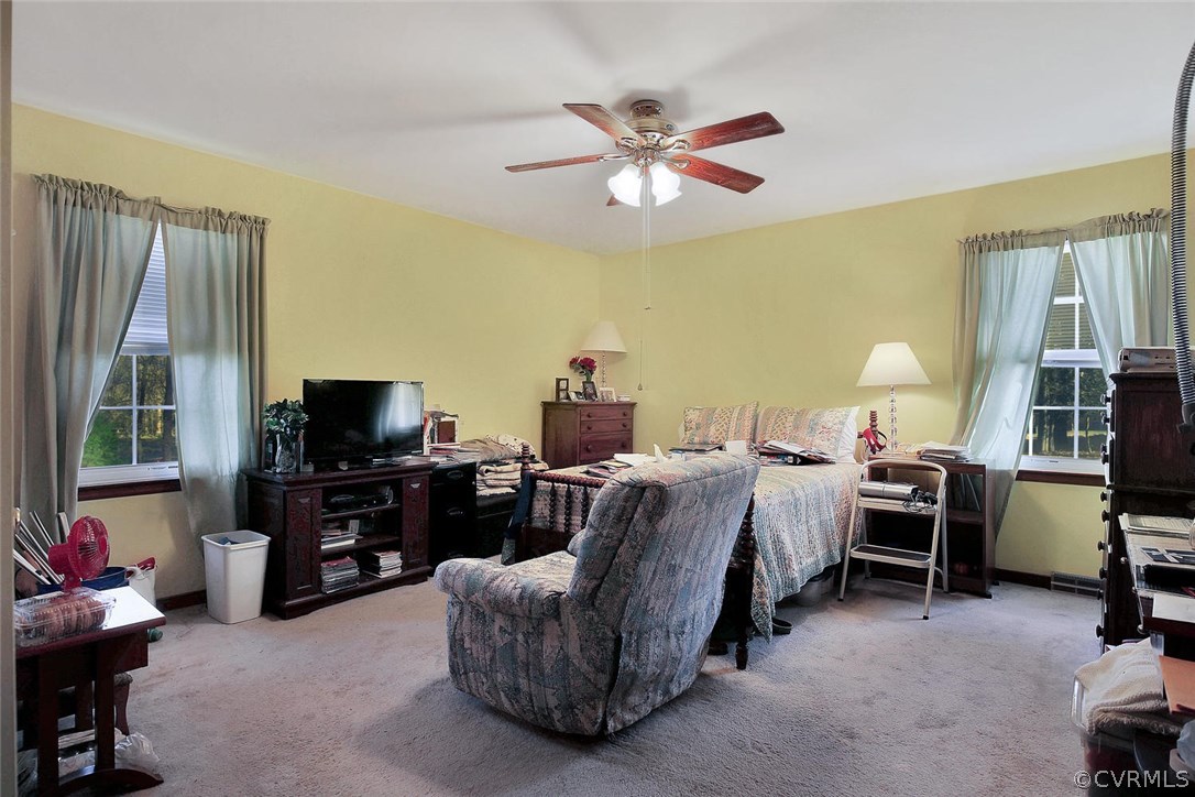 11301 Celtic Road Chesterfield, VA 23838 - Photo 15 of 27 a living room with furniture and a flat screen tv