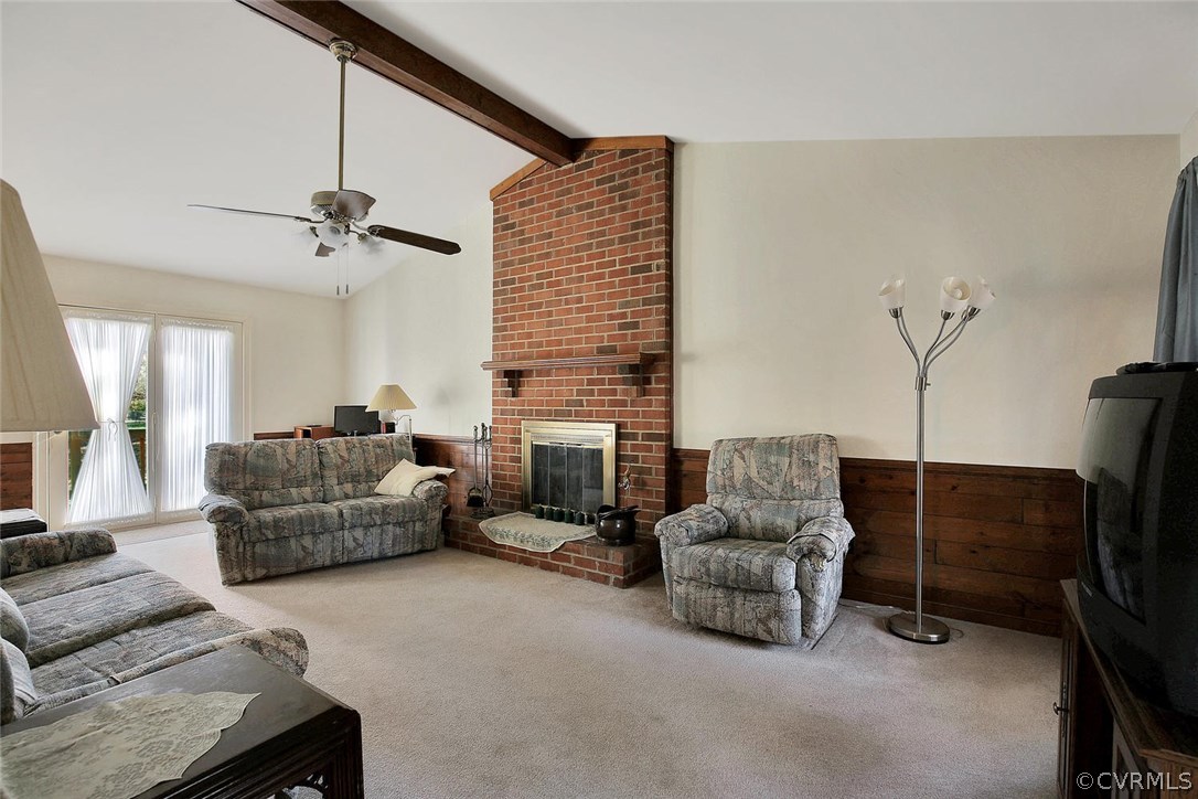 11301 Celtic Road Chesterfield, VA 23838 - Photo 2 of 27 a living room with furniture and a flat screen tv