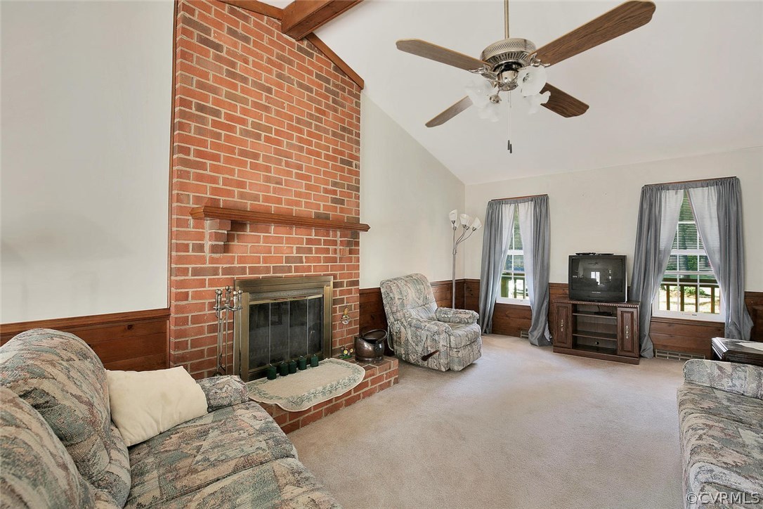 11301 Celtic Road Chesterfield, VA 23838 - Photo 8 of 27 a living room with furniture and a fireplace