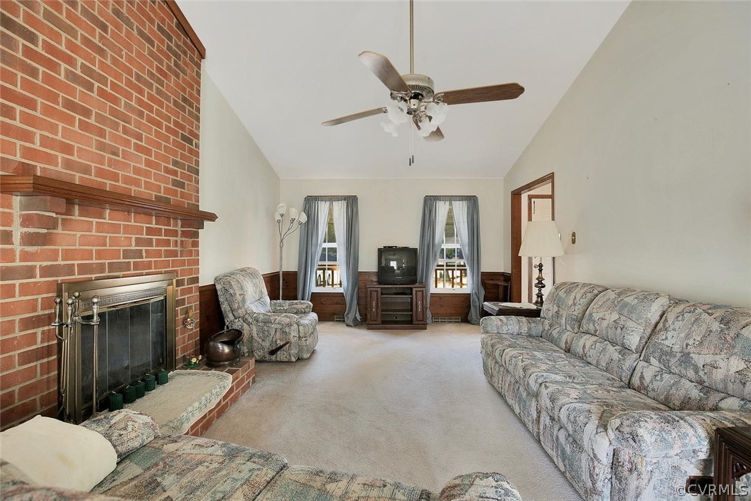 11301 Celtic Road Chesterfield, VA 23838 - Photo 9 of 27 a living room with furniture and a fireplace