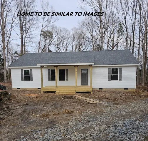 a house with trees in the background