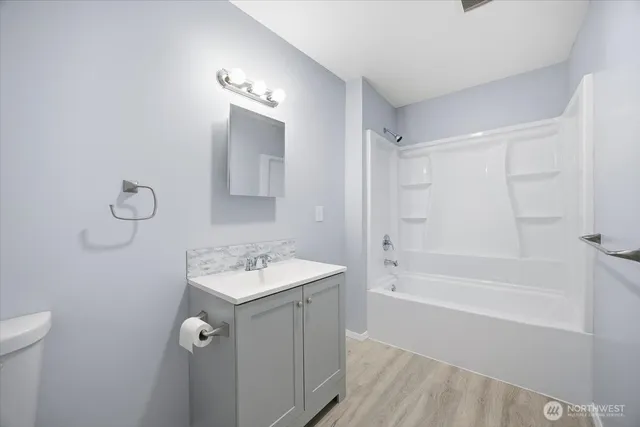 a bathroom with a sink toilet shower and bathtub