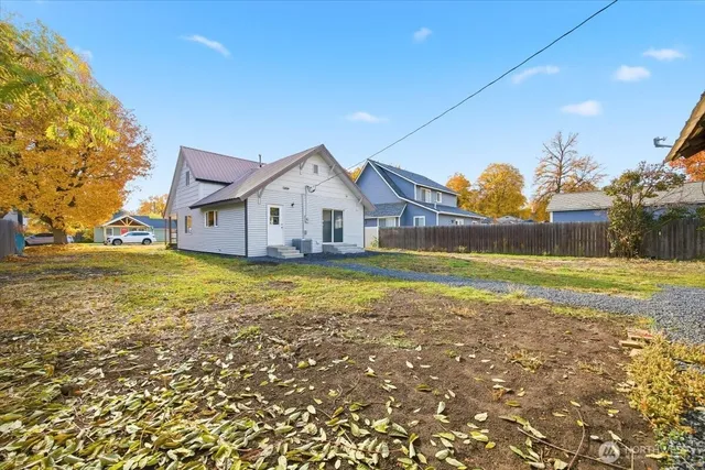 a view of a house with a big yard