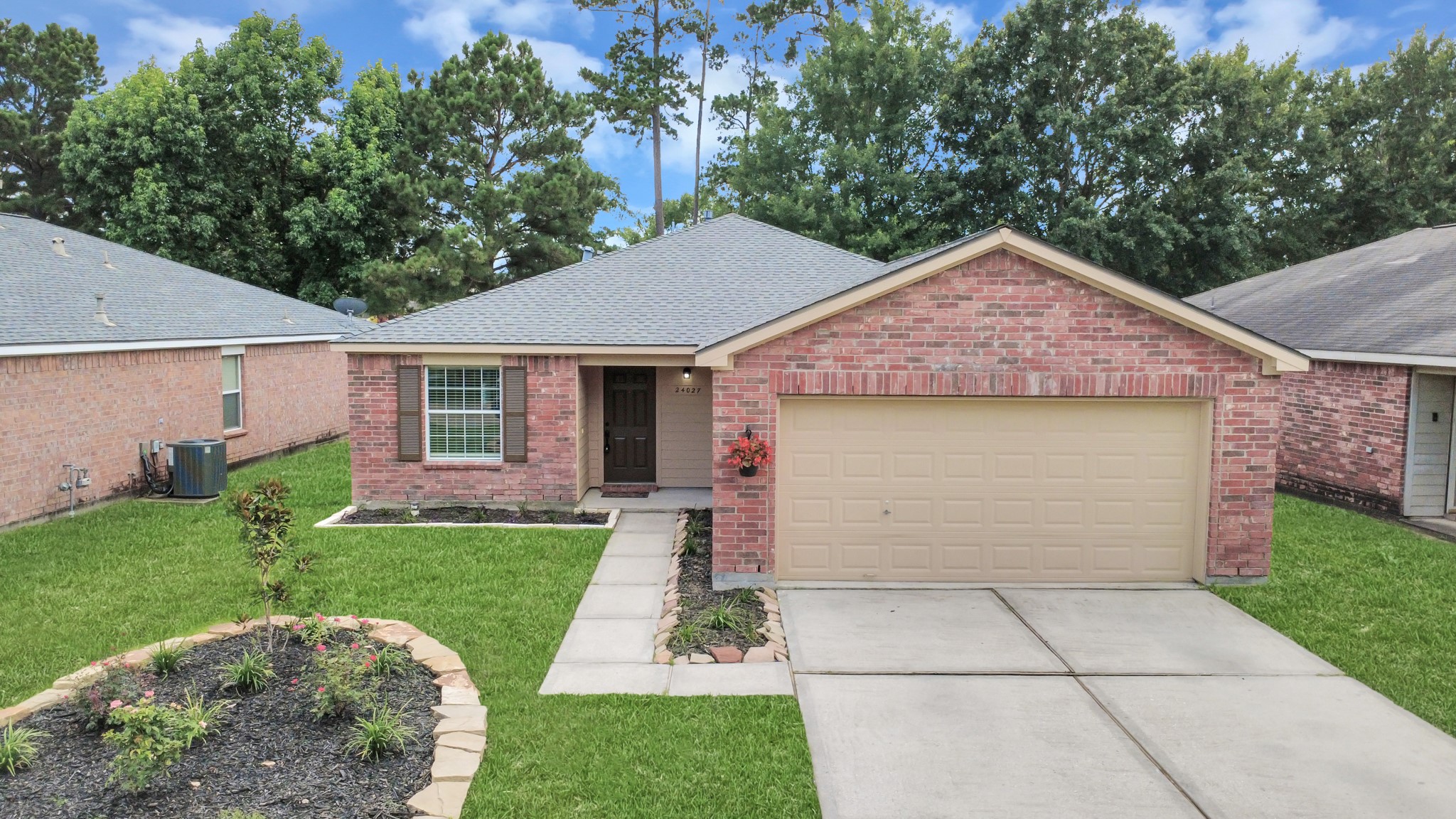 24027 Pinecreek Point Spring, TX 77373 - Photo 6 of 41 Beautiful Low Maintenance front yard