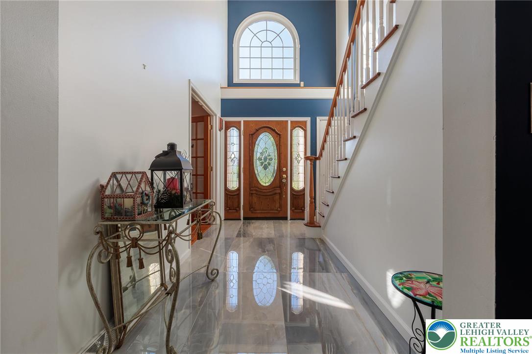 2170 Clearview Road Coplay, PA 18037 - Photo 15 of 75 Enter into a bright foyer featuring polished floors and a striking arched window.