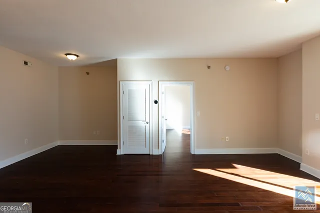 a view of entryway with wooden floor