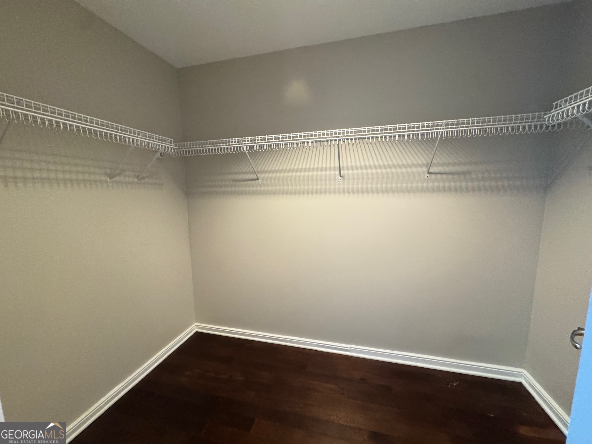 285 Centennial Olympic Park Drive Northwest, Unit 1106 Atlanta, GA 30313 - Photo 28 of 44 a view of a room with shelf on the wall