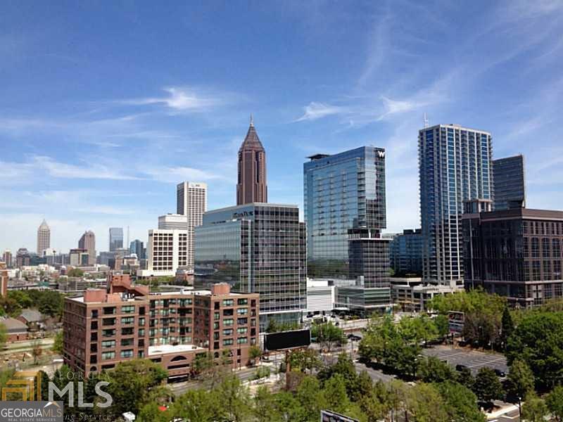 285 Centennial Olympic Park Drive Northwest, Unit 1106 Atlanta, GA 30313 - Photo 29 of 44 a view of a city with tall buildings