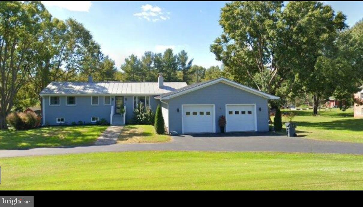 8746 Meetze Road Warrenton, VA 20187 - Photo 1 of 48 a house view with a outdoor space