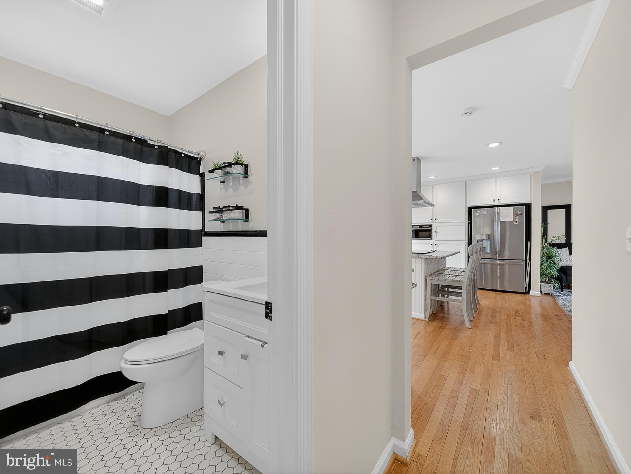 8746 Meetze Road Warrenton, VA 20187 - Photo 23 of 48 a bathroom with a toilet and a shower