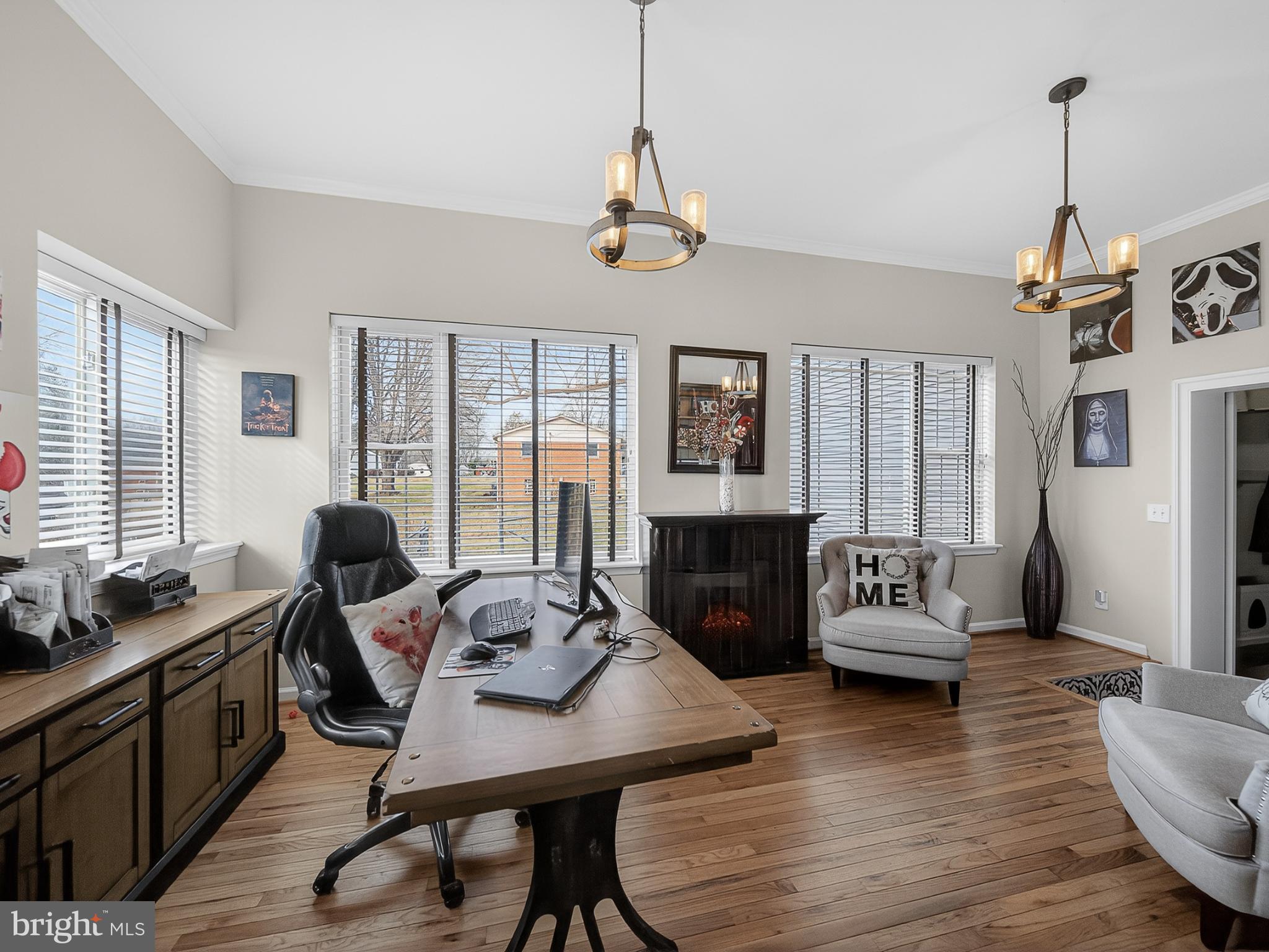 8746 Meetze Road Warrenton, VA 20187 - Photo 26 of 48 a view of a livingroom with workspace and a couch