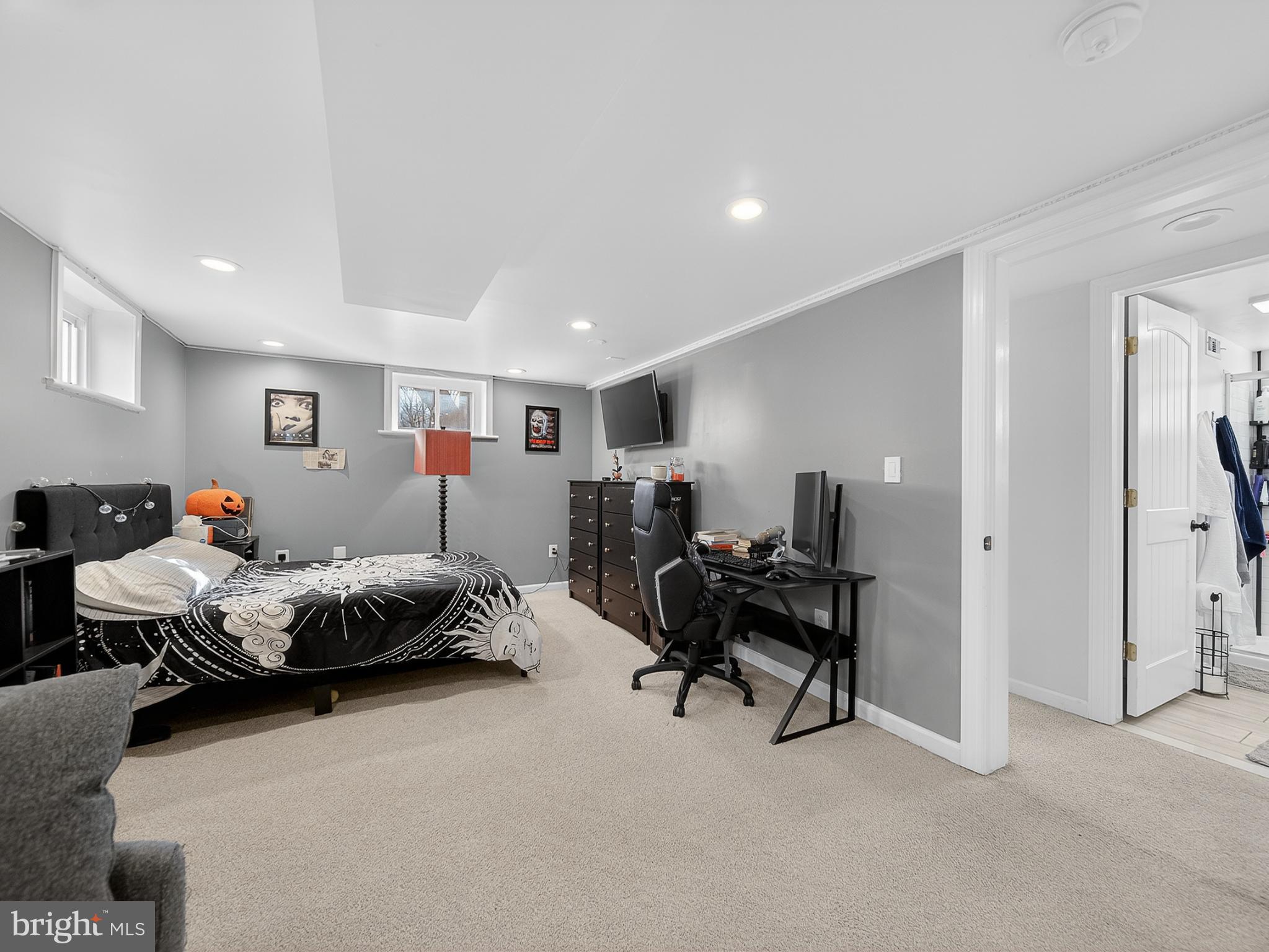 8746 Meetze Road Warrenton, VA 20187 - Photo 37 of 48 a bedroom with furniture and a large window