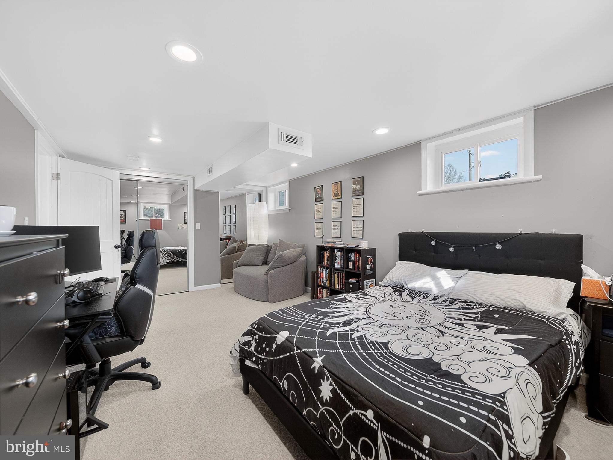 8746 Meetze Road Warrenton, VA 20187 - Photo 38 of 48 a bed room with a bed and furniture