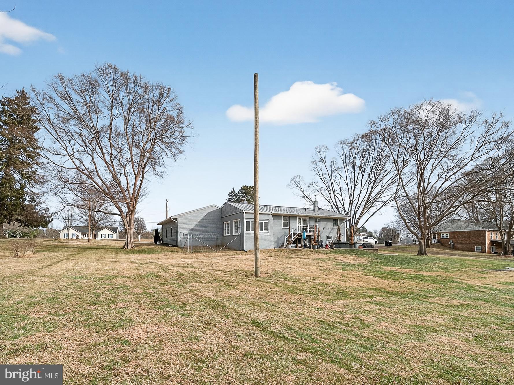 8746 Meetze Road Warrenton, VA 20187 - Photo 43 of 48 a view of a house with a yard