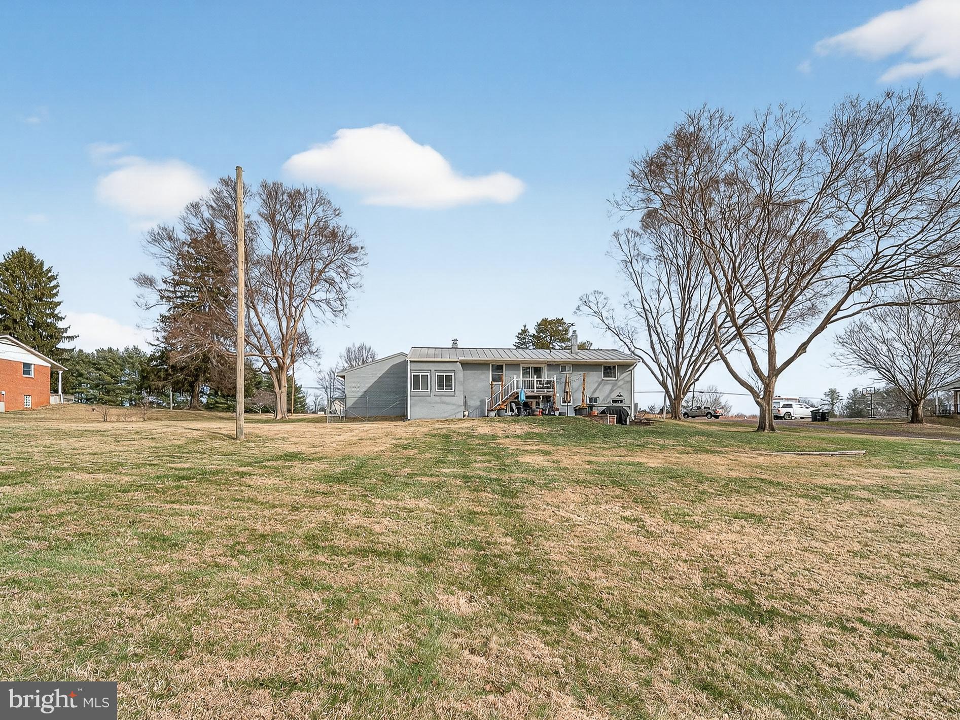 8746 Meetze Road Warrenton, VA 20187 - Photo 44 of 48 a view of a house with a yard