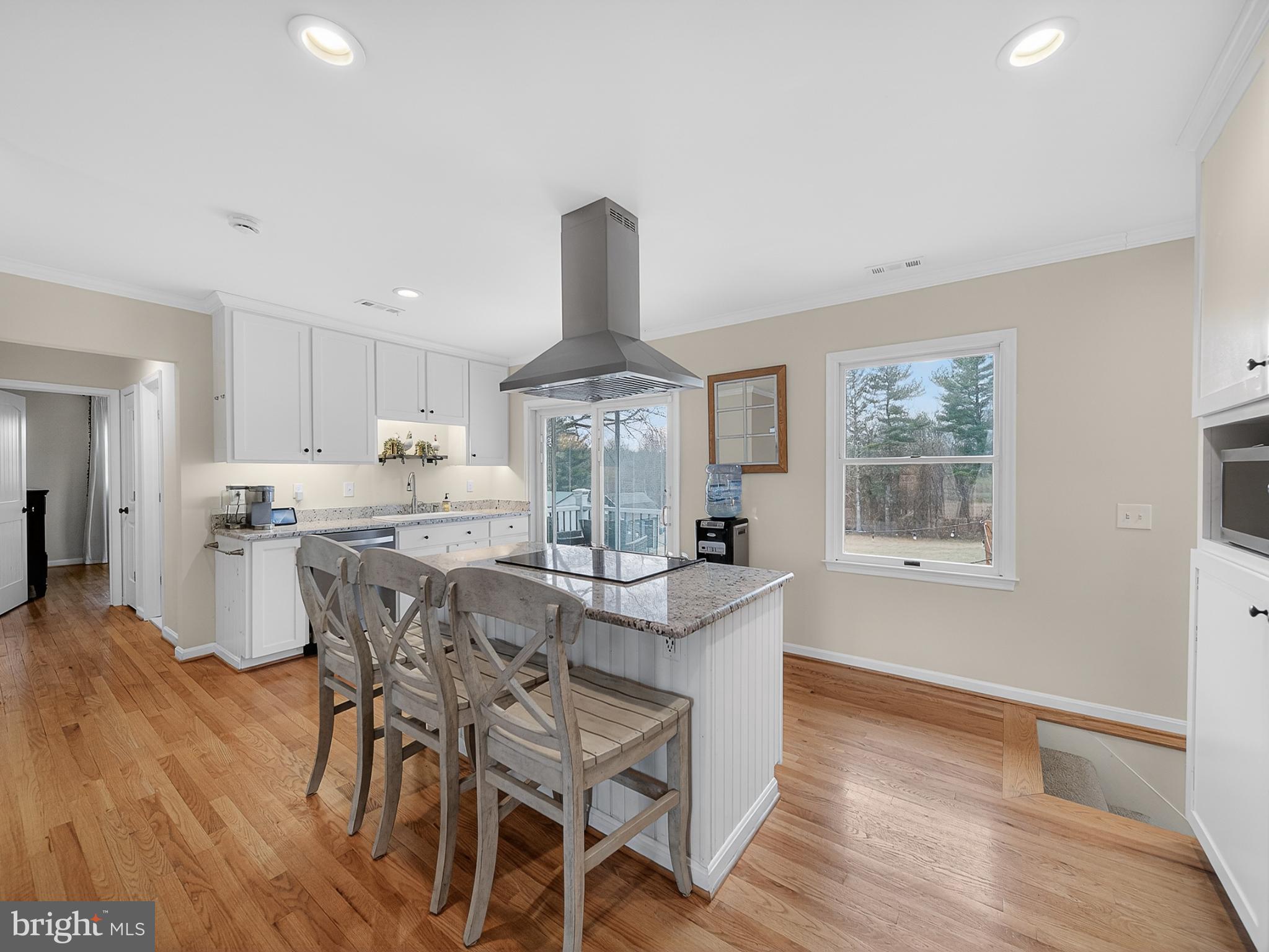 8746 Meetze Road Warrenton, VA 20187 - Photo 9 of 48 a view of a dining room with furniture window and wooden floor