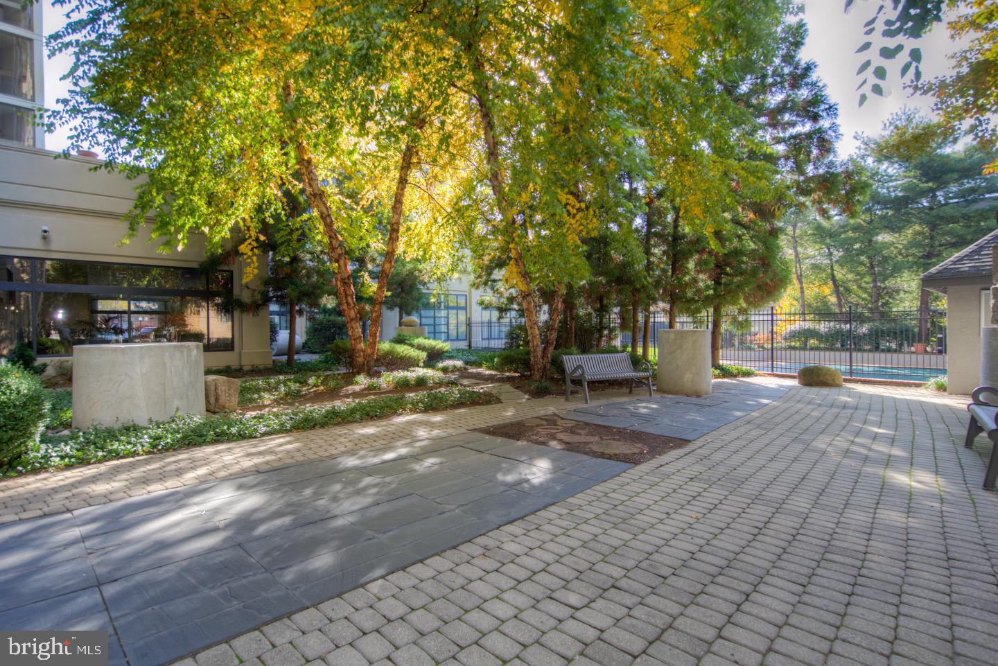 2001 Hamilton Street, Unit 927 Philadelphia, PA 19130 - Photo 16 of 26 a street view with large trees