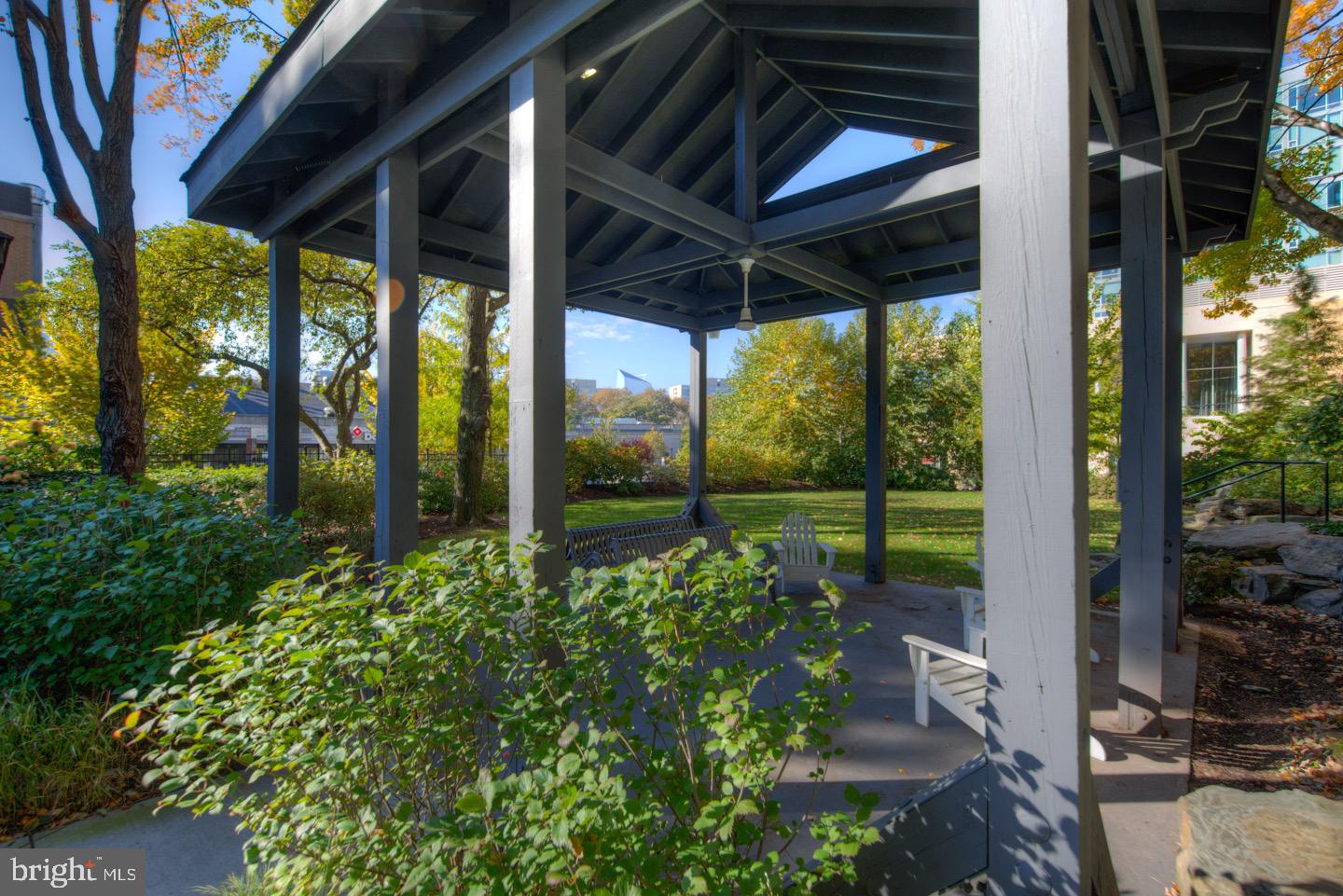 2001 Hamilton Street, Unit 927 Philadelphia, PA 19130 - Photo 17 of 26 a view of a porch with furniture and garden