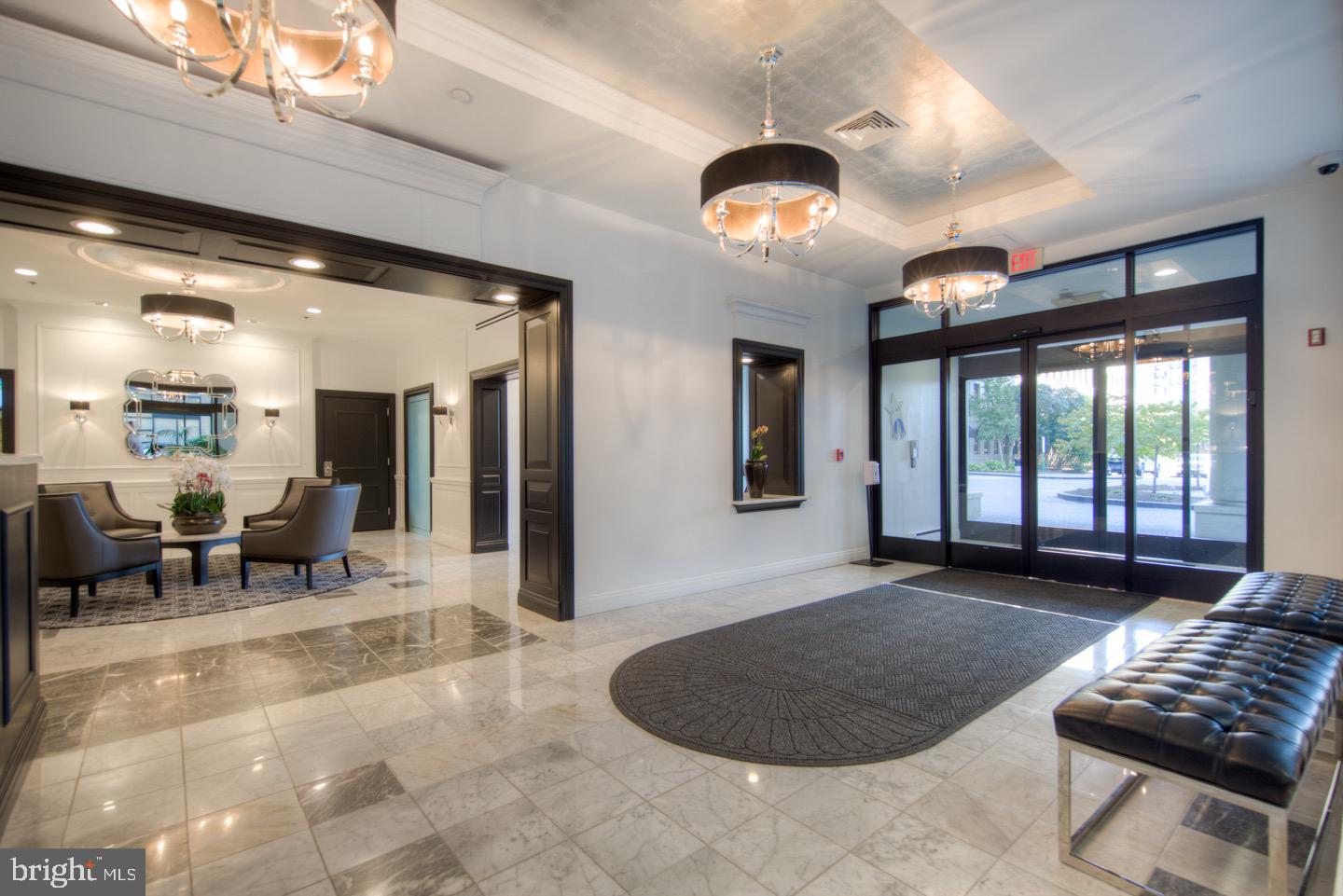 2001 Hamilton Street, Unit 927 Philadelphia, PA 19130 - Photo 22 of 26 a living room with furniture and a large window