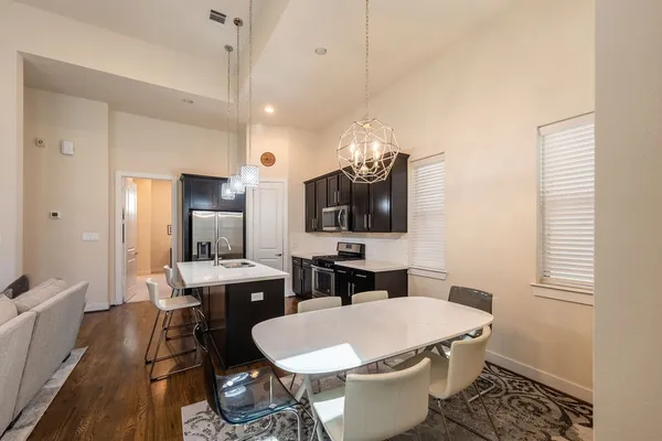 a bathroom with a toilet a sink and a mirror