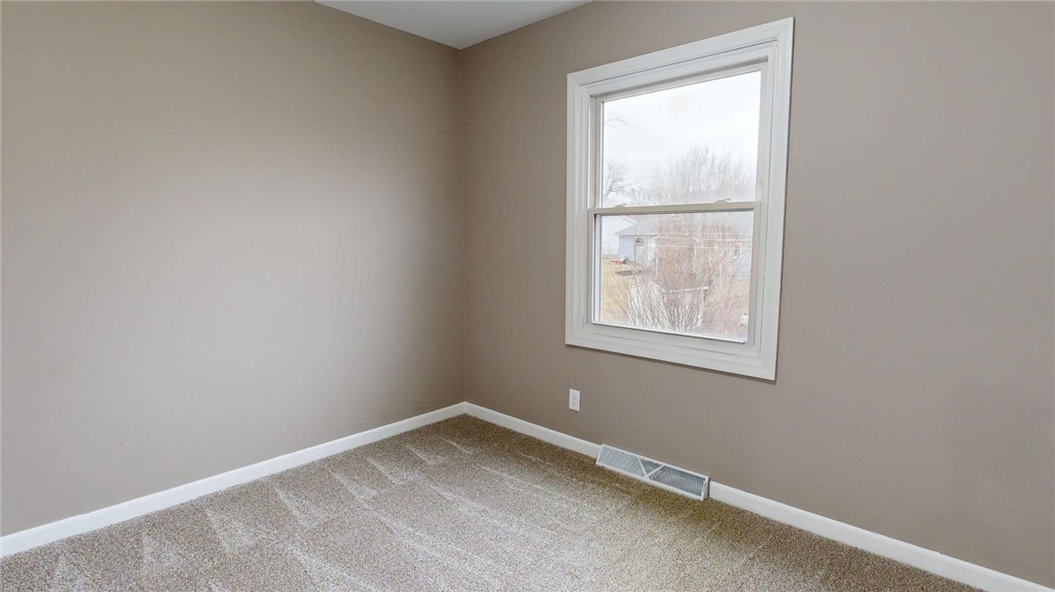4153 Buckingham Drive Decatur, IL 62526 - Photo 21 of 34 an empty room with a window