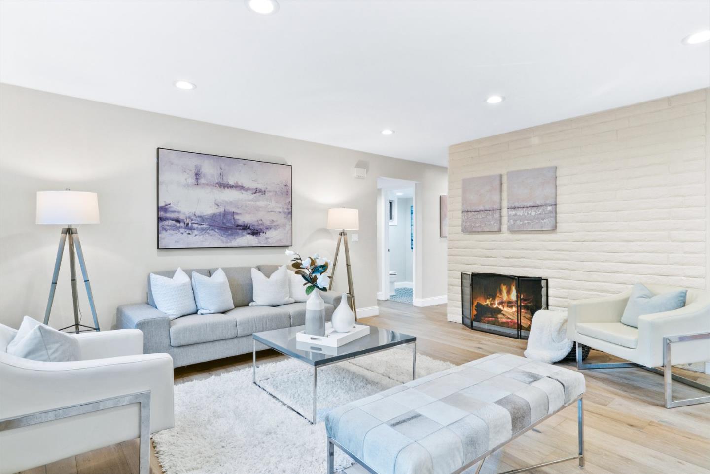 777 Rustic Lane Mountain View, CA 94040 - Photo 15 of 44 a living room with furniture and a fireplace
