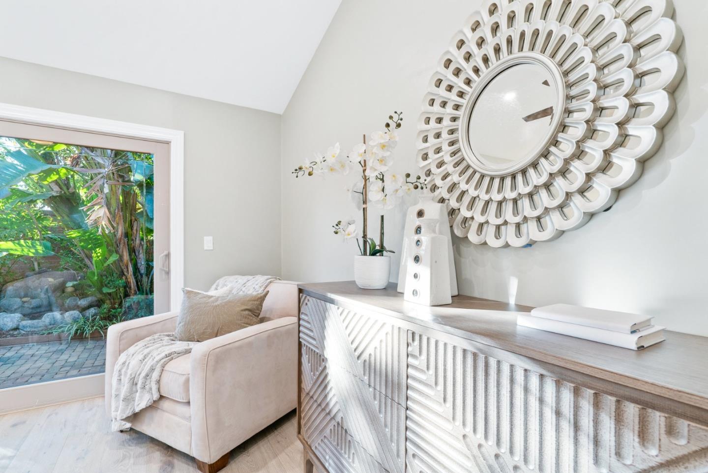 777 Rustic Lane Mountain View, CA 94040 - Photo 23 of 44 a living room with furniture and a large window