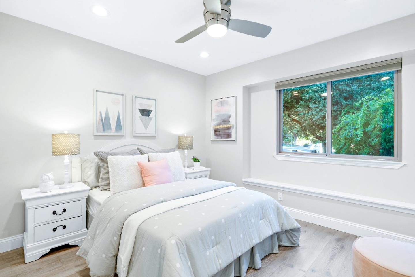 777 Rustic Lane Mountain View, CA 94040 - Photo 29 of 44 a bedroom with a large bed and a window