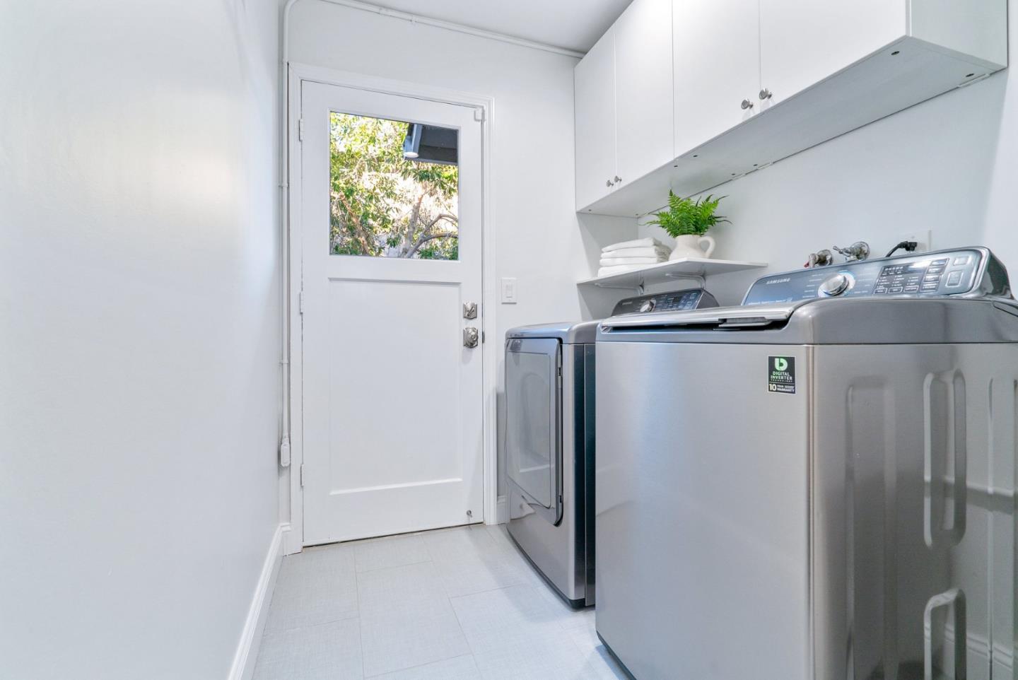777 Rustic Lane Mountain View, CA 94040 - Photo 37 of 44 a kitchen with stainless steel appliances a refrigerator a sink a stove a counter top space and a window