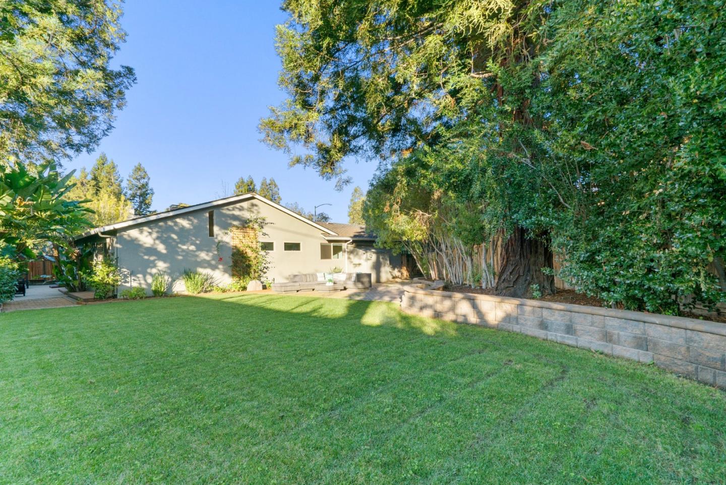777 Rustic Lane Mountain View, CA 94040 - Photo 43 of 44 a view of a house with a yard