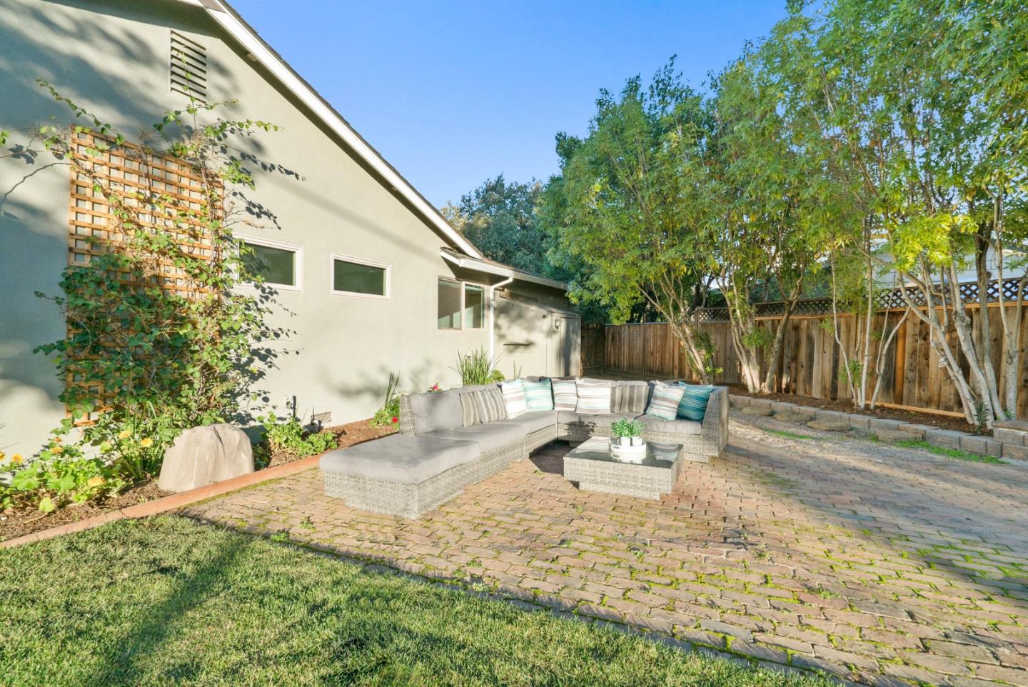 777 Rustic Lane Mountain View, CA 94040 - Photo 44 of 44 a view of a chair and tables in the backyard of a house