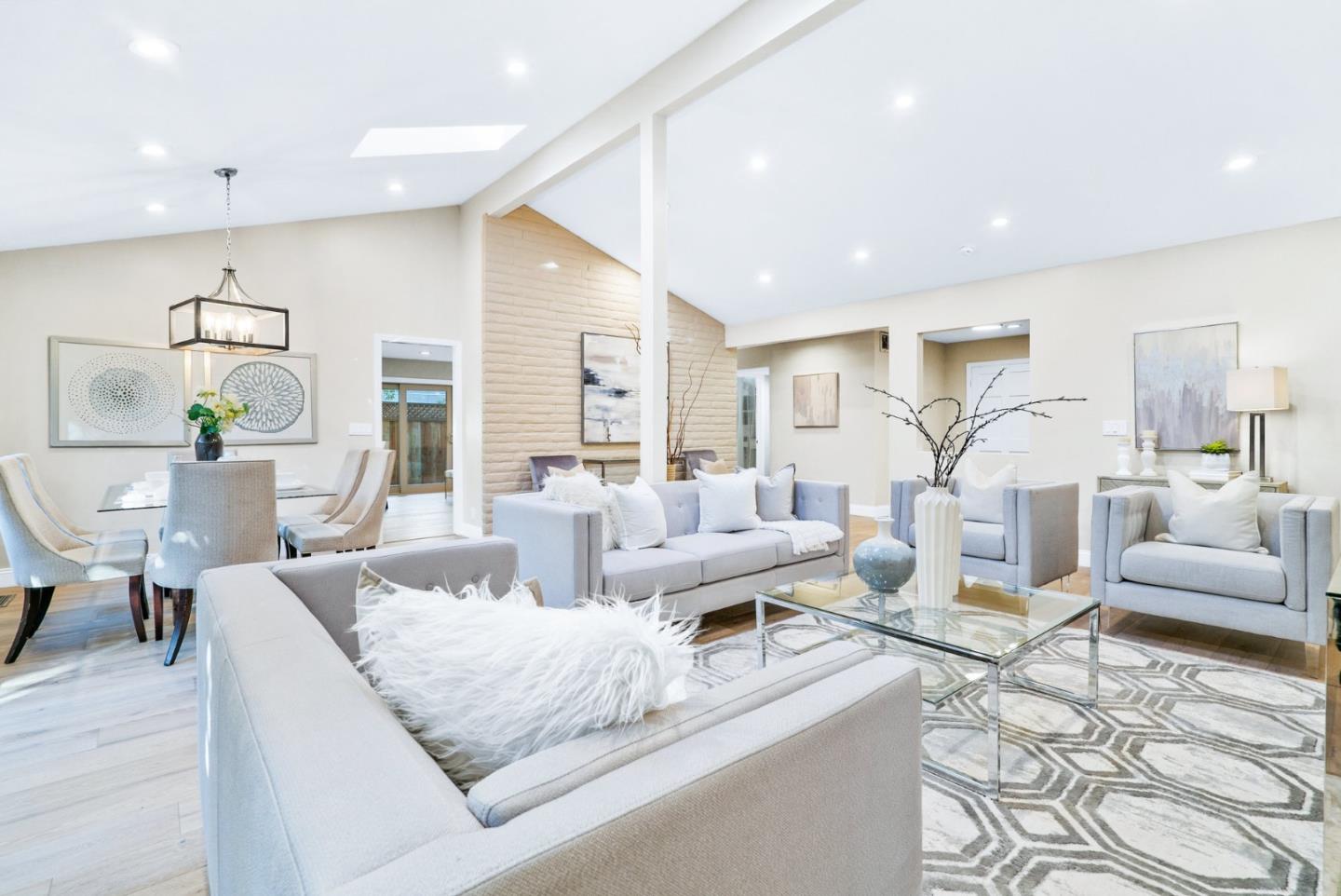 777 Rustic Lane Mountain View, CA 94040 - Photo 7 of 44 a living room with furniture and a large window