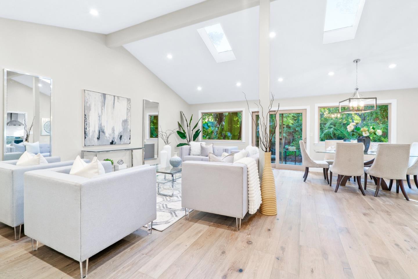 777 Rustic Lane Mountain View, CA 94040 - Photo 8 of 44 a living room with furniture a wooden floor and windows