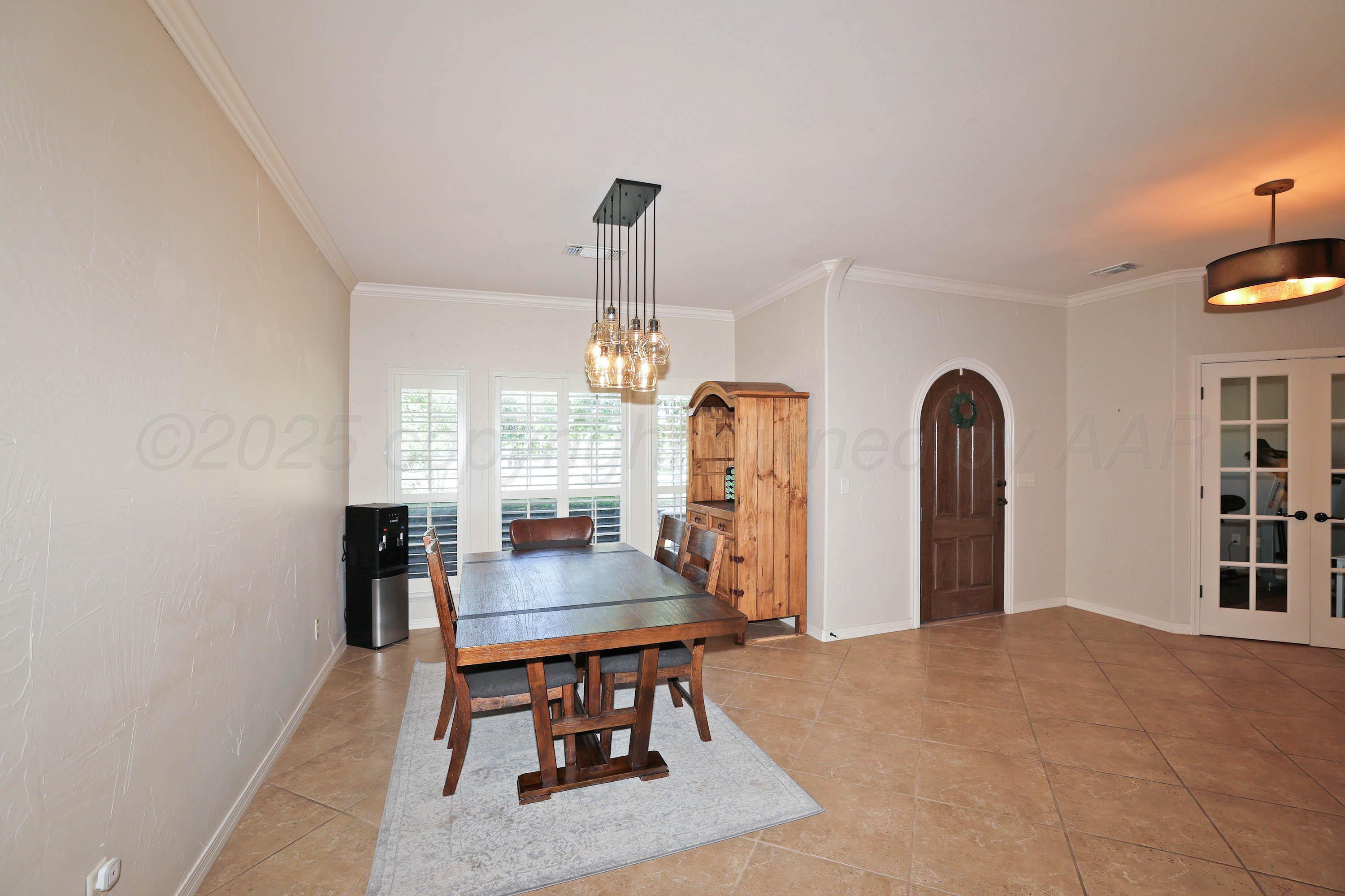 9220 Greyhawk Road Amarillo, TX 79119 - Photo 11 of 50 a dining room with furniture and window
