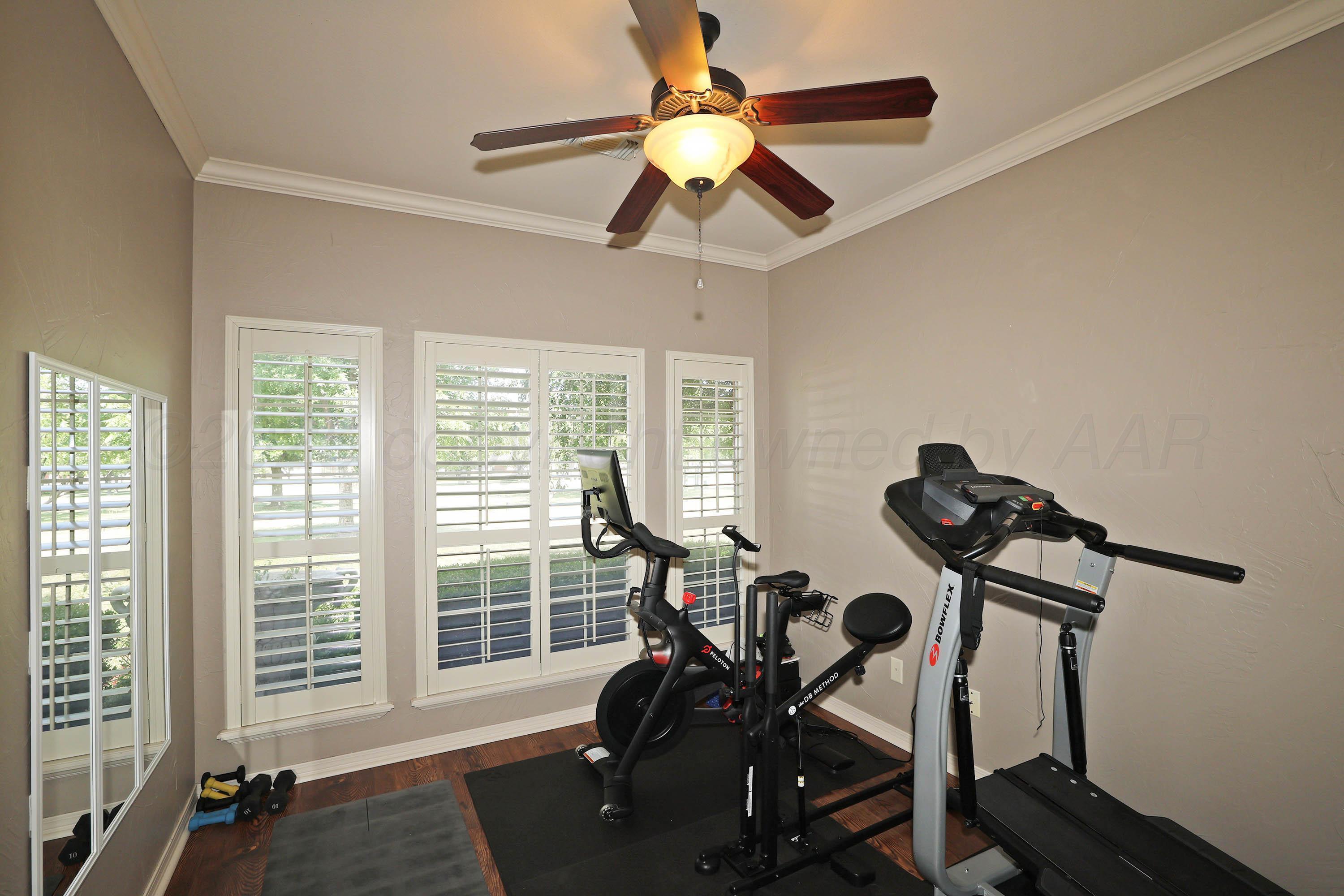 9220 Greyhawk Road Amarillo, TX 79119 - Photo 15 of 50 a view of a room with gym equipment