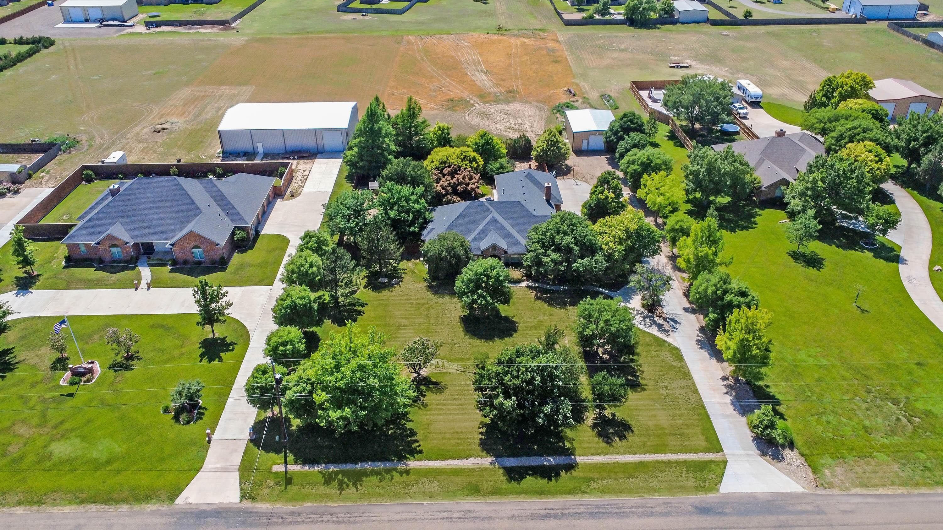 9220 Greyhawk Road Amarillo, TX 79119 - Photo 3 of 50 an aerial view of house with yard
