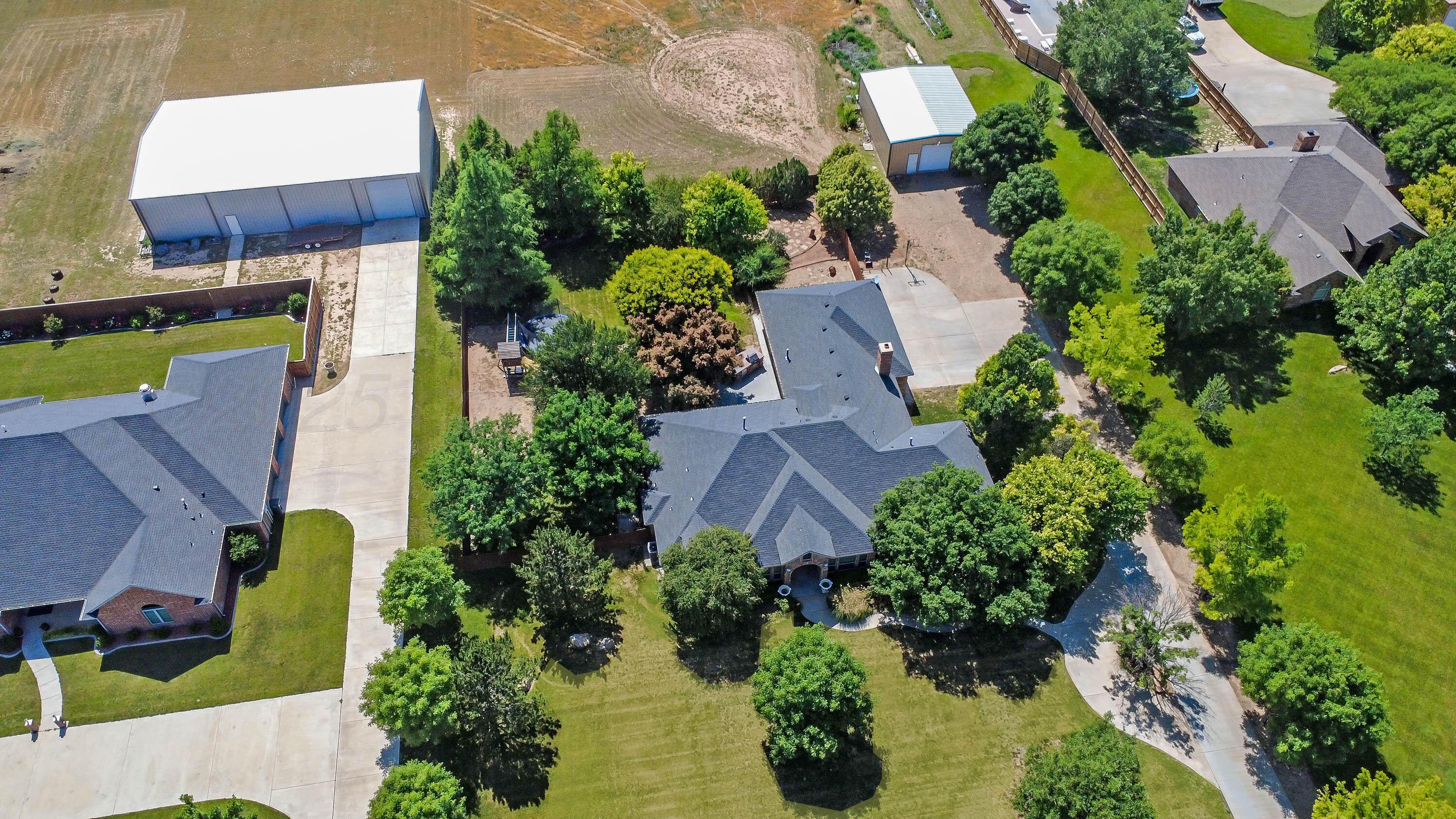 9220 Greyhawk Road Amarillo, TX 79119 - Photo 4 of 50 an aerial view of a house