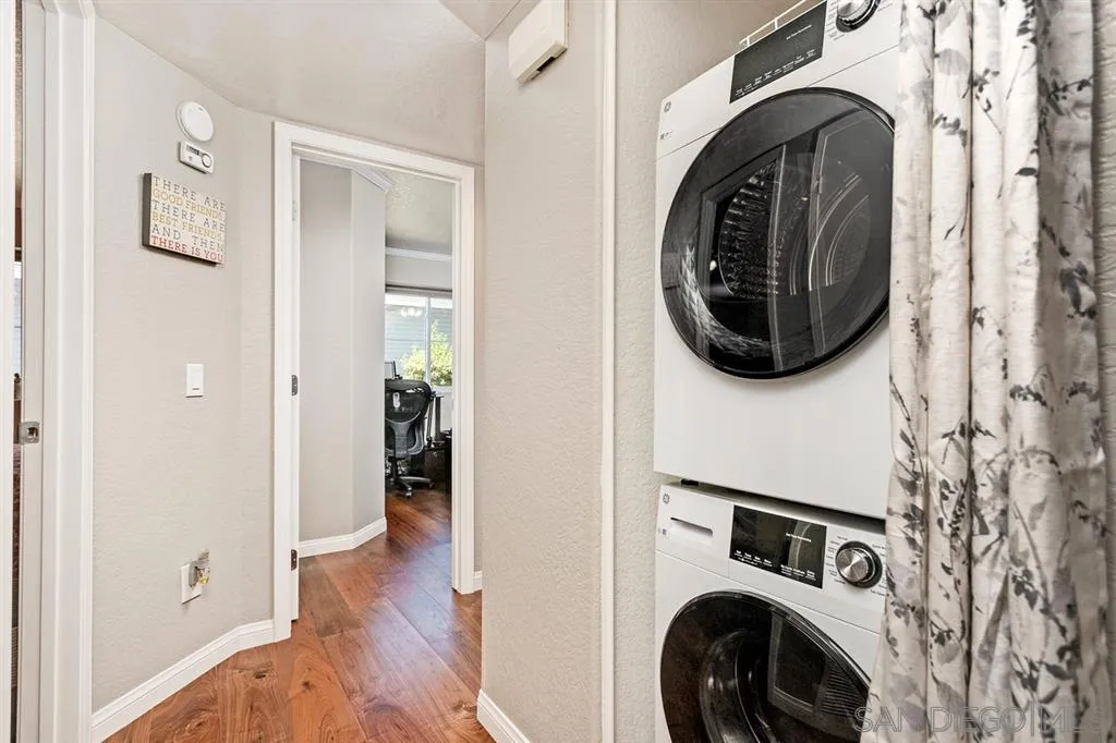 13955 Midland Road Poway, CA 92064 - Photo 21 of 25 a view of a hallway with washer and dryer