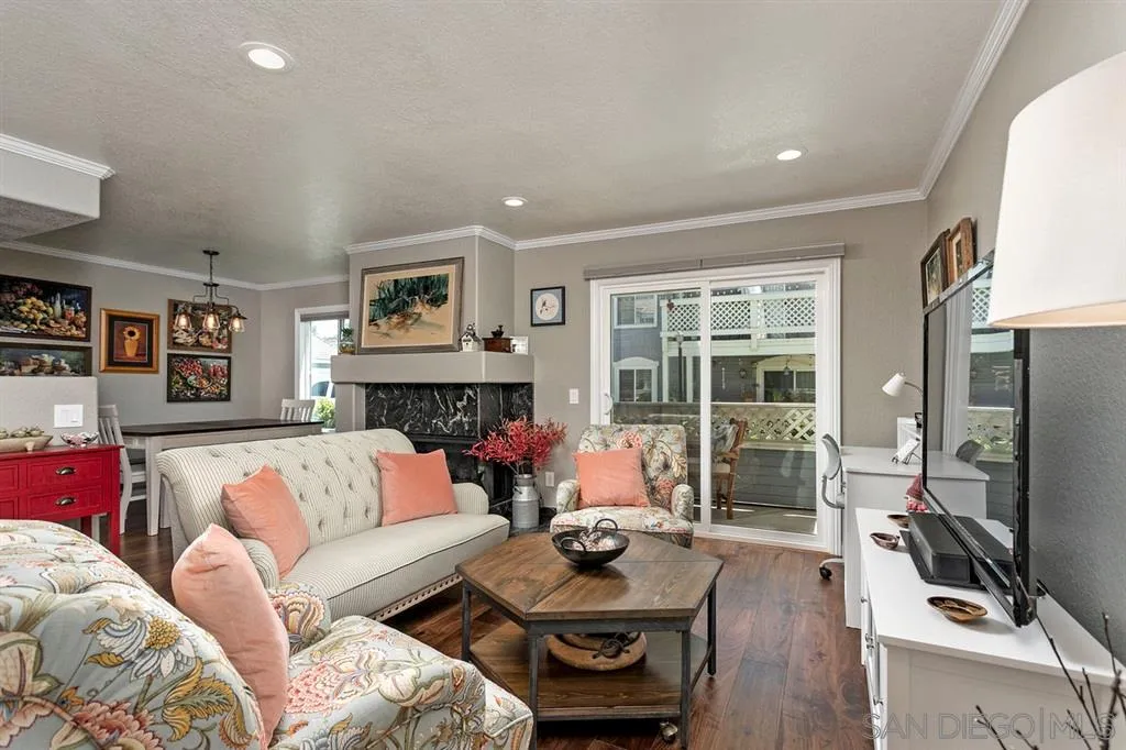 13955 Midland Road Poway, CA 92064 - Photo 5 of 25 a living room with furniture fireplace and a flat screen tv