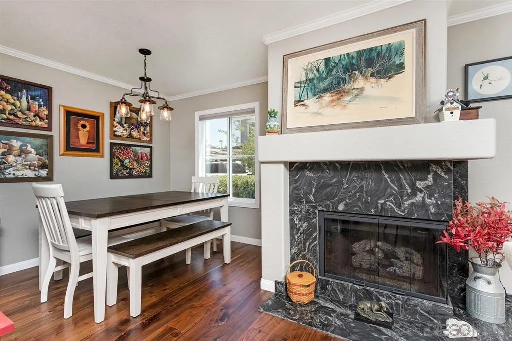 13955 Midland Road Poway, CA 92064 - Photo 8 of 25 a living room with furniture a flat screen tv and a fireplace