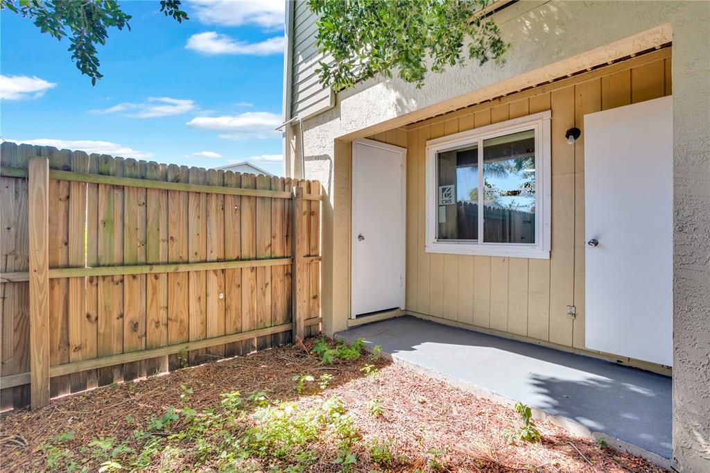 209 Red Cedar Place, Unit 209 Brandon, FL 33510 - Photo 34 of 56 a view of a house with a backyard