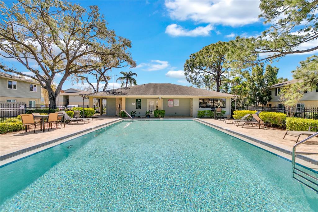 209 Red Cedar Place, Unit 209 Brandon, FL 33510 - Photo 5 of 56 a view of a house with swimming pool and sitting area