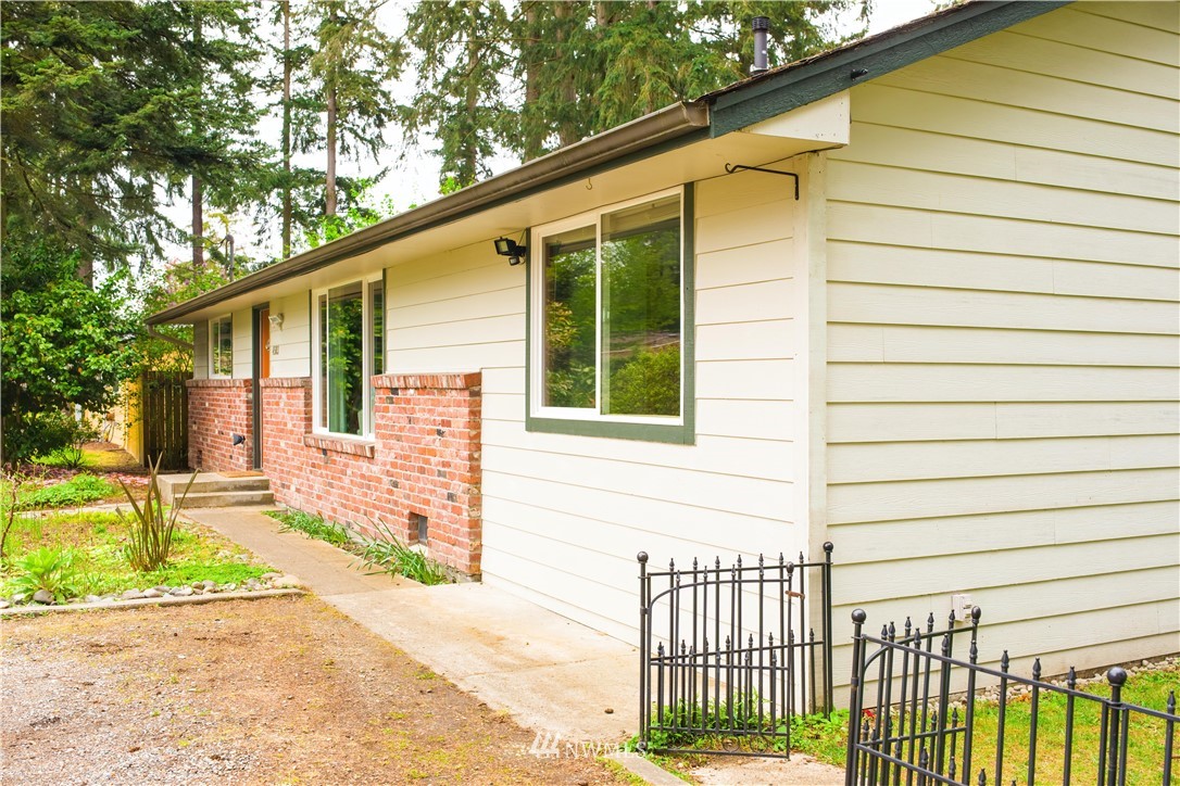 4503 Northeast 17th Place Renton, WA 98059 - Photo 2 of 21 a front view of a house with a yard