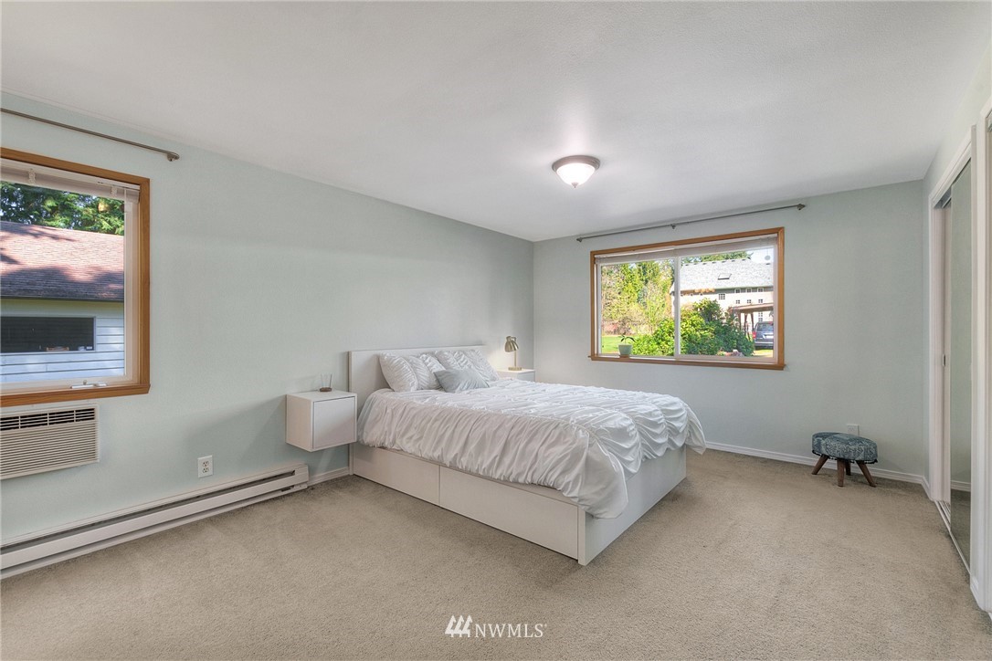 4503 Northeast 17th Place Renton, WA 98059 - Photo 11 of 21 a bedroom with bed and a window