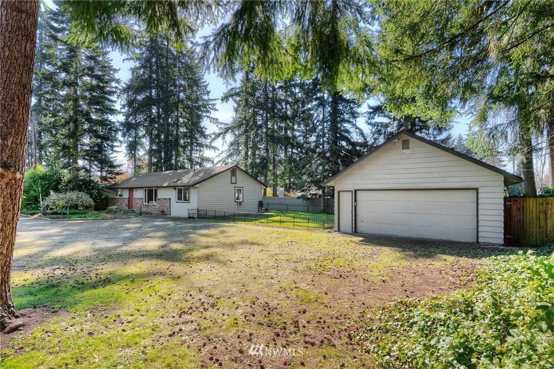 4503 Northeast 17th Place Renton, WA 98059 - Photo 21 of 21 a house with a tree in front of it