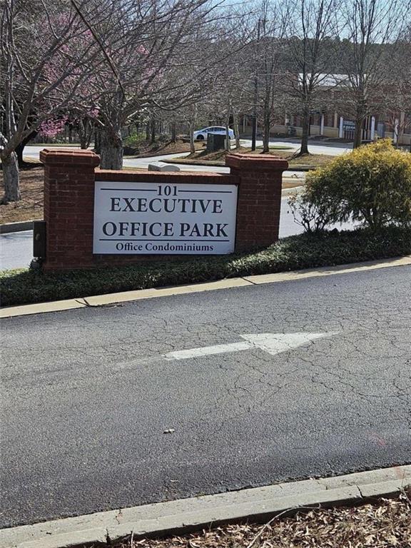 101 Devant Street, Unit 901 Fayetteville, GA 30214 - Photo 1 of 14 a view of outdoor space with signage