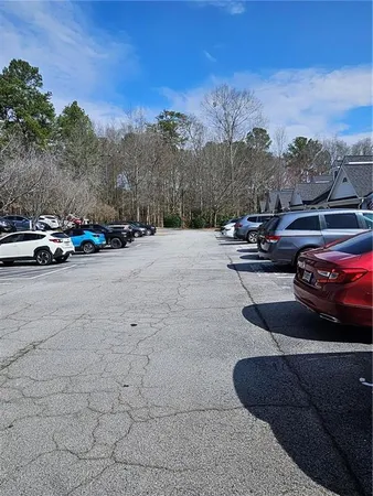 a view of street with parked cars