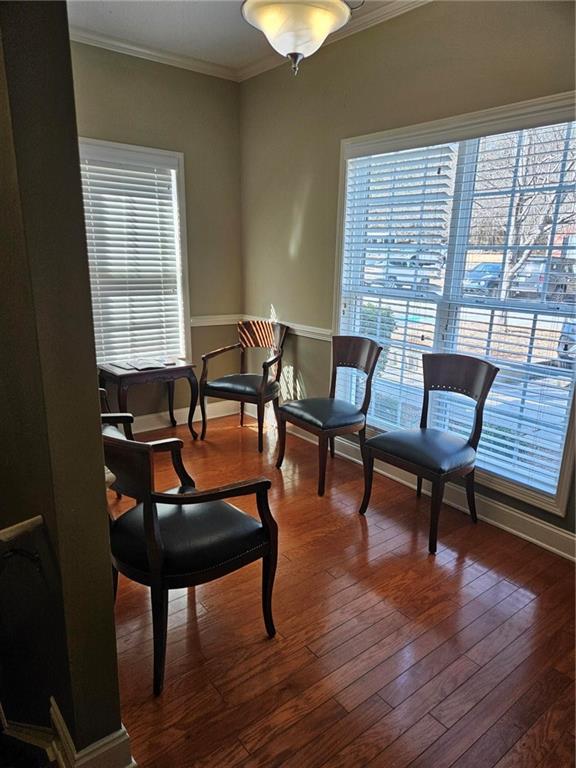 101 Devant Street, Unit 901 Fayetteville, GA 30214 - Photo 4 of 14 a living room with furniture and a wooden floor
